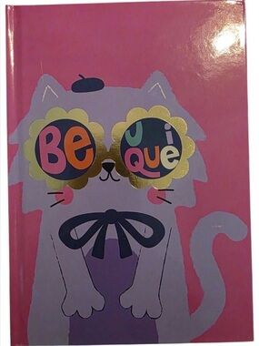 Journal “Be Unique" design of a pink cat wearing gold sunglasses and a blue bow